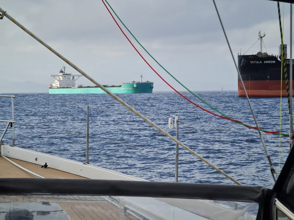 Tankers seen from a sailing yacht cockpit