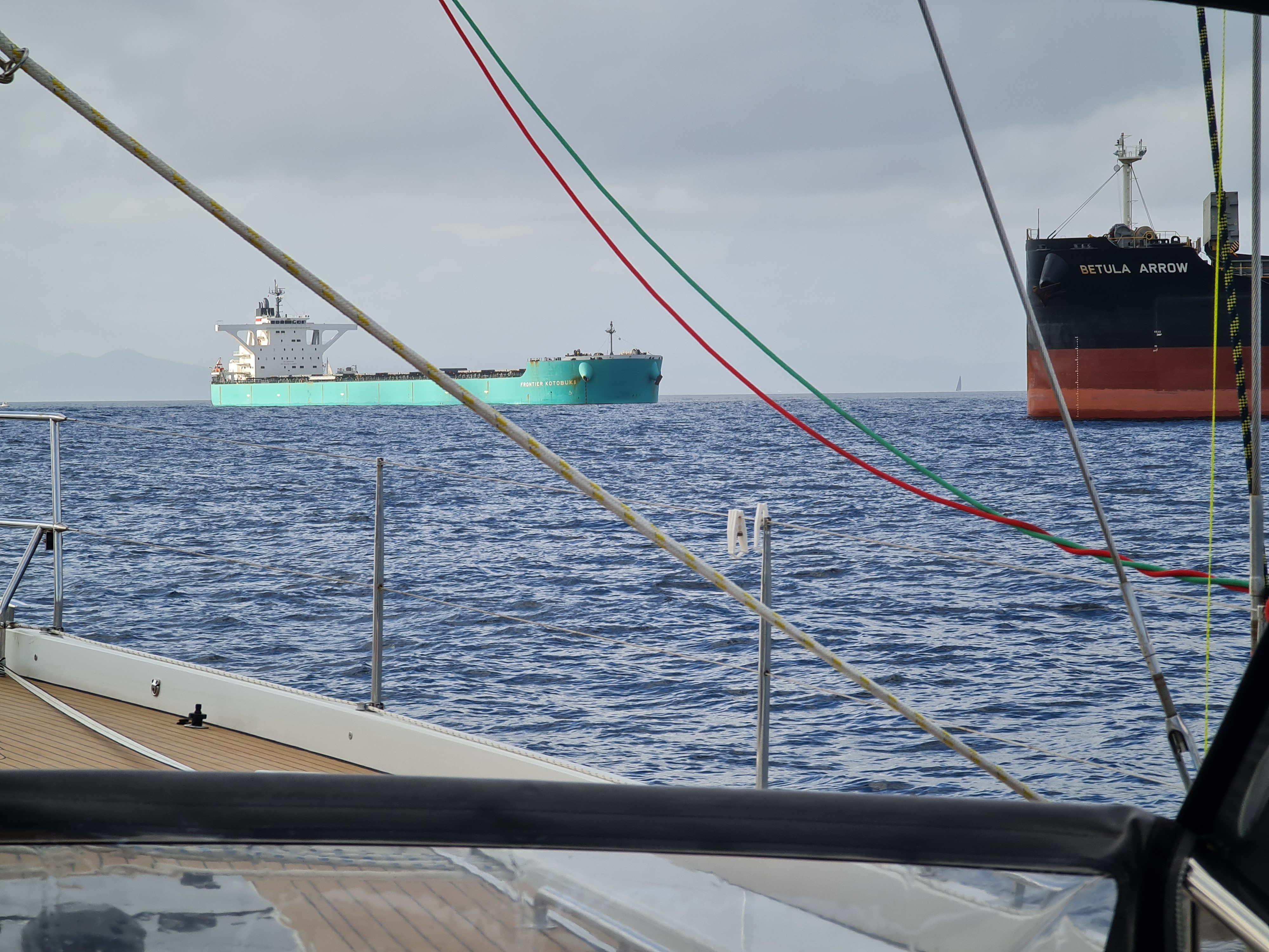 Tankers seen from a sailing yacht cockpit